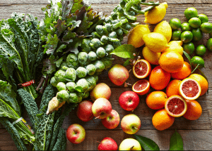 a group of fruits and vegetables on a wood surface Healthy Weight Loss Diets Datchet